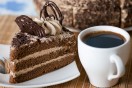 a cup of gourmet coffee and cake